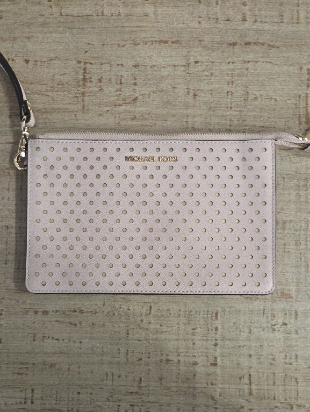 Michael Kors Light Pink Perforated Wristlet with Gold Accents